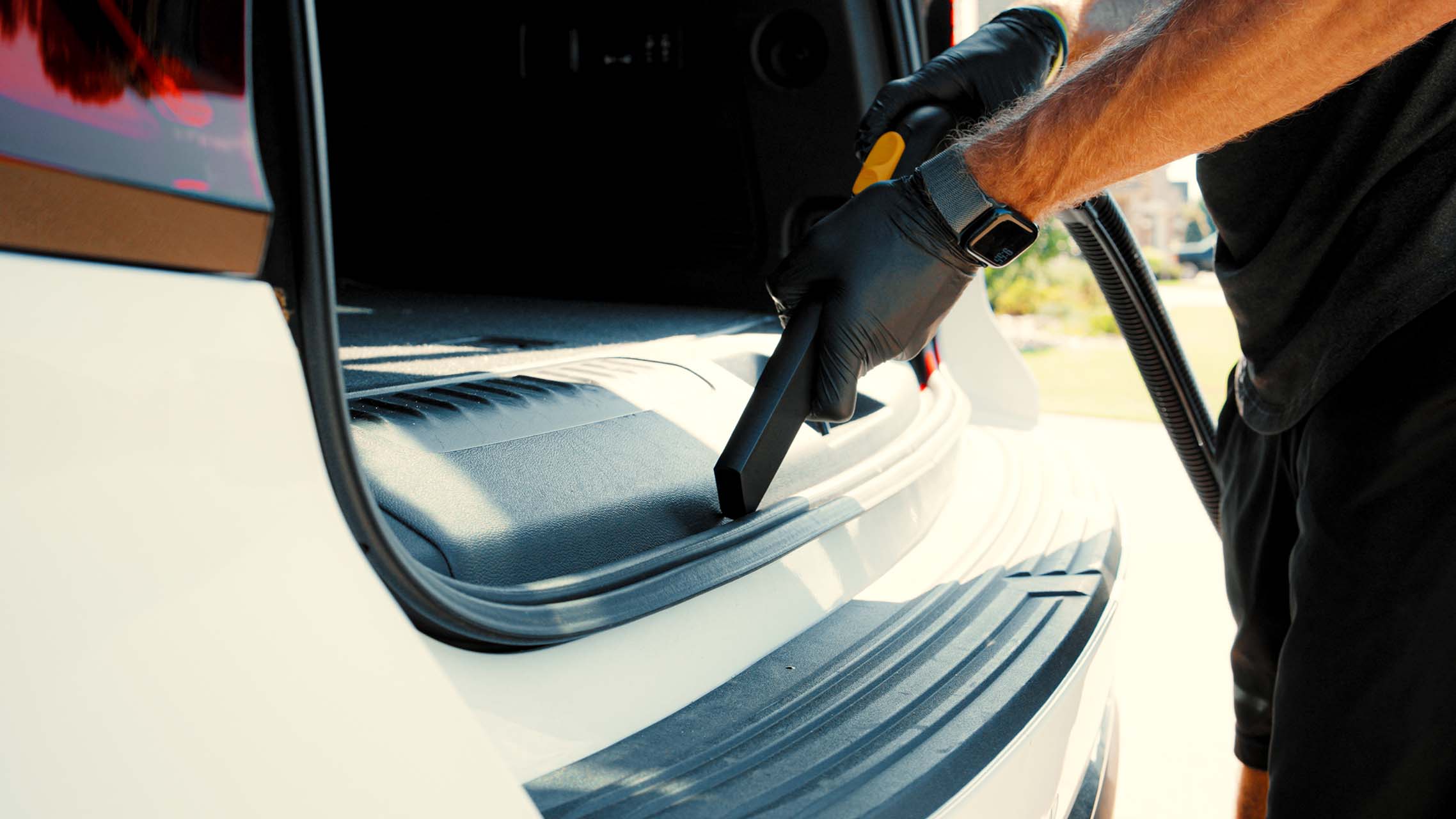Vacuuming the inside of an SUV